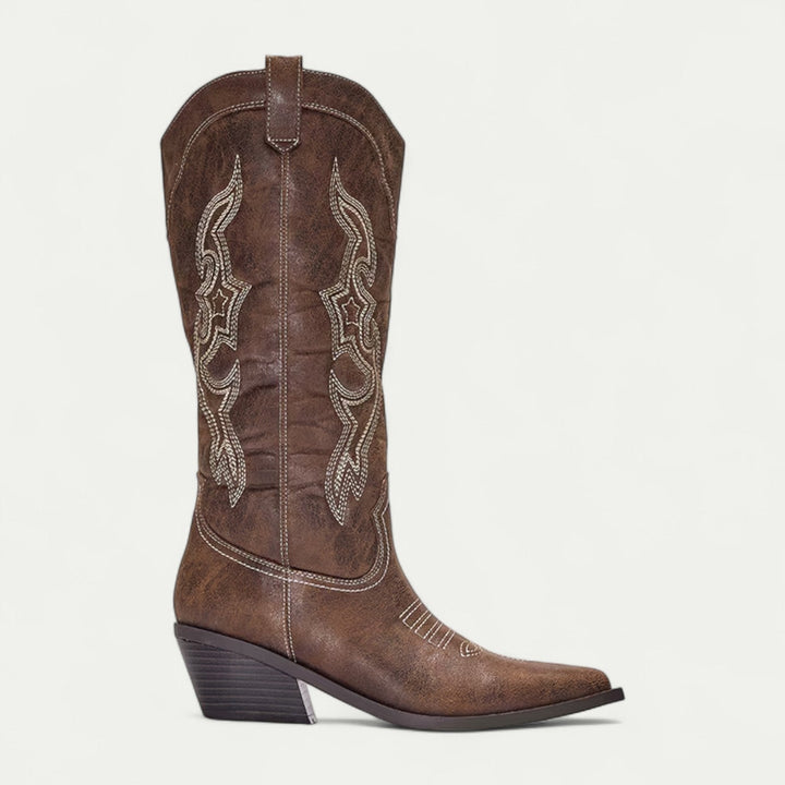 Chic women's calf-high cowboy boots with pointed toe. Perfect Western fashion boots for daily style.