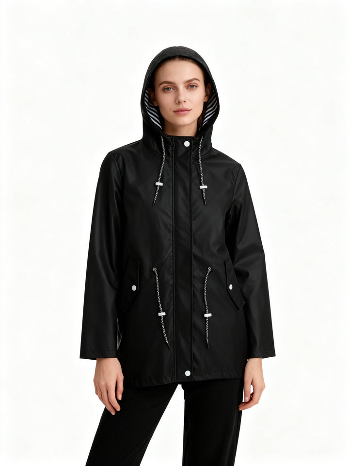 Relaxed fit women's rain jacket, hooded and water repellent for comfortable, casual everyday wear in spring.