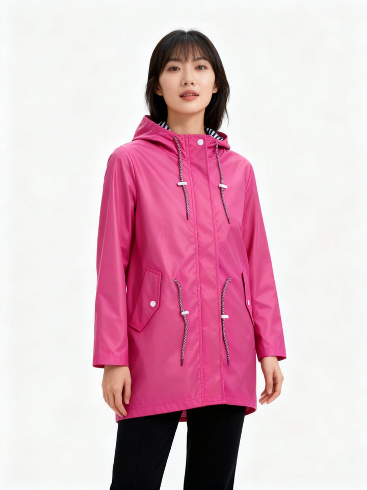 Elegant women's hooded rain jacket, water repellent for reliable weather protection during spring and fall.
