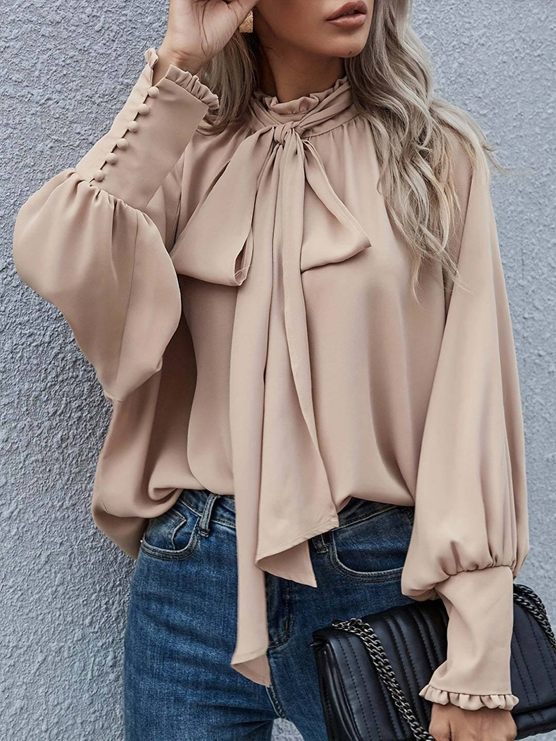 Dressy long sleeve women's blouse with sophisticated tie neck detail, perfect for formal wear.
