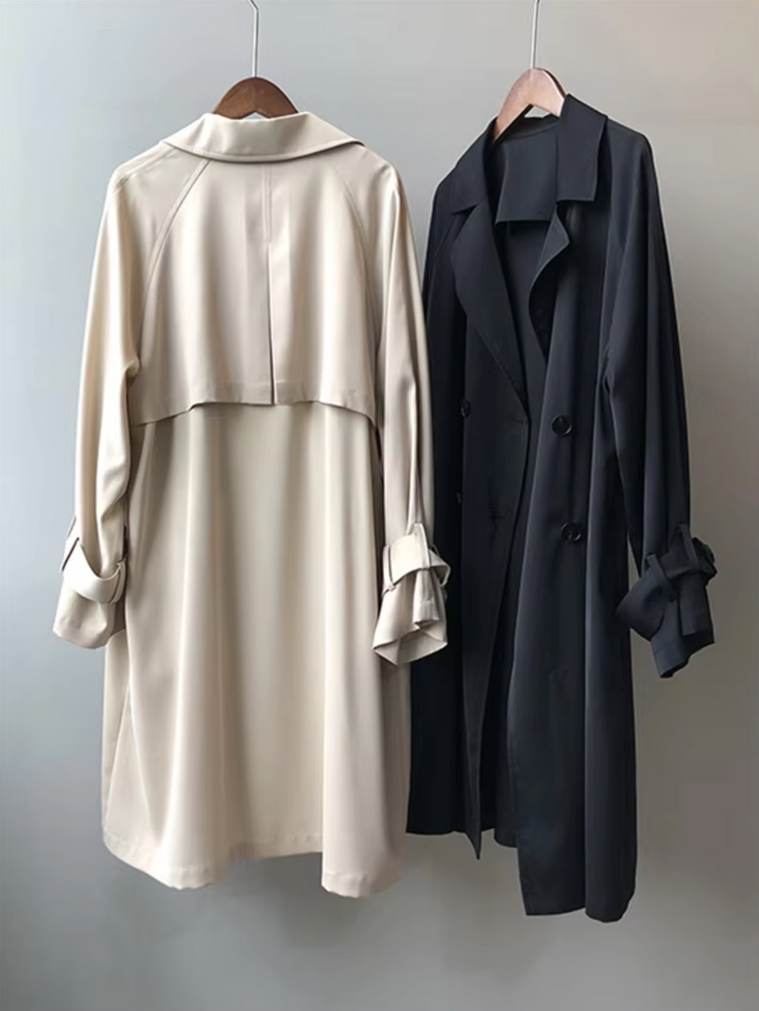 Fashionable women's beige long waterproof trench coat, ideal versatile outerwear for elegant classic spring and autumn looks.
