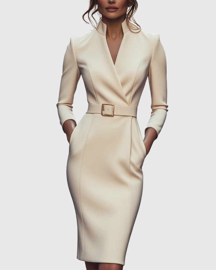 Three-quarter sleeve detail of a women's elegant midi dress. Structured for professional office attire.