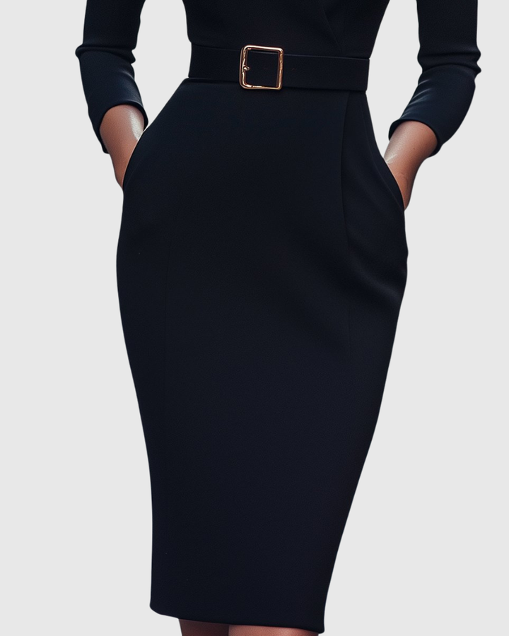 Textured fabric of a women's three-quarter sleeve midi dress, offering an elegant & structured pencil fit.