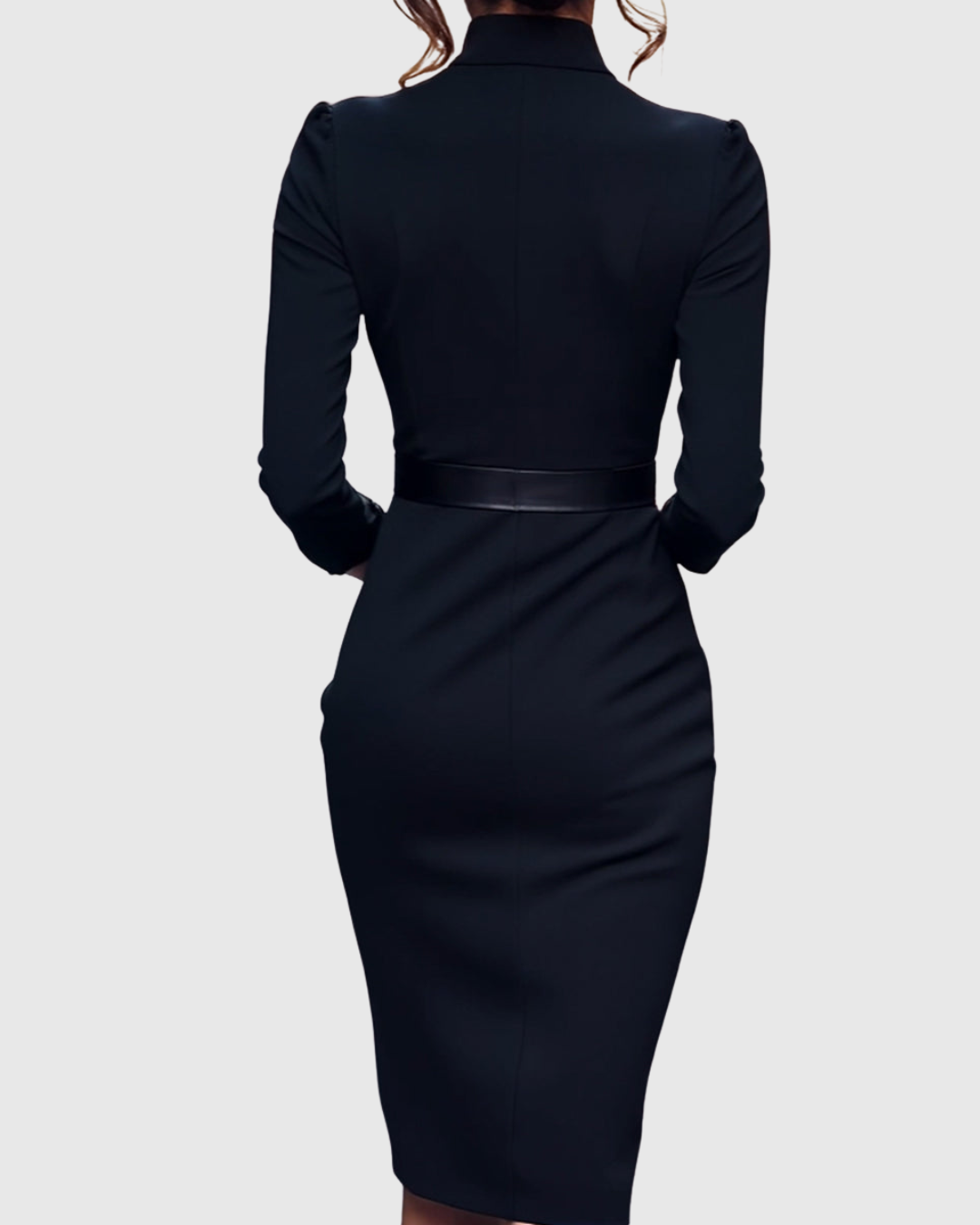 Side profile of a women's elegant midi dress, highlighting the structured silhouette & belted waist.