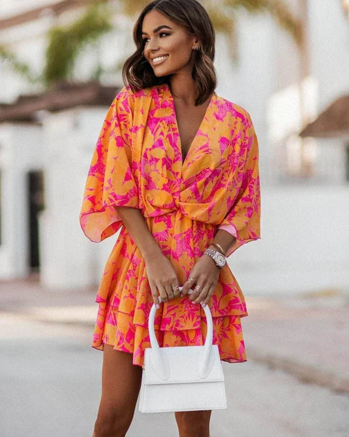Vibrant patterned women's summer dress, flowy and stylish, perfect for casual wear, beach, or brunch.