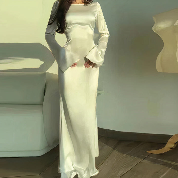 Elegant women's long sleeve maxi dress, perfect for party wear or a chic fall/winter event. Effortless style.