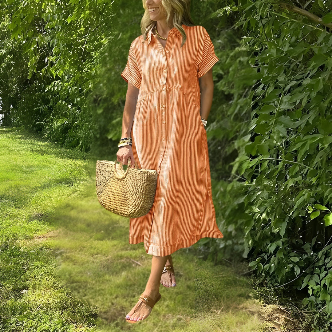 Stylish women's midi dress with elegant stripes and long sleeves, ensuring a flattering and chic look.