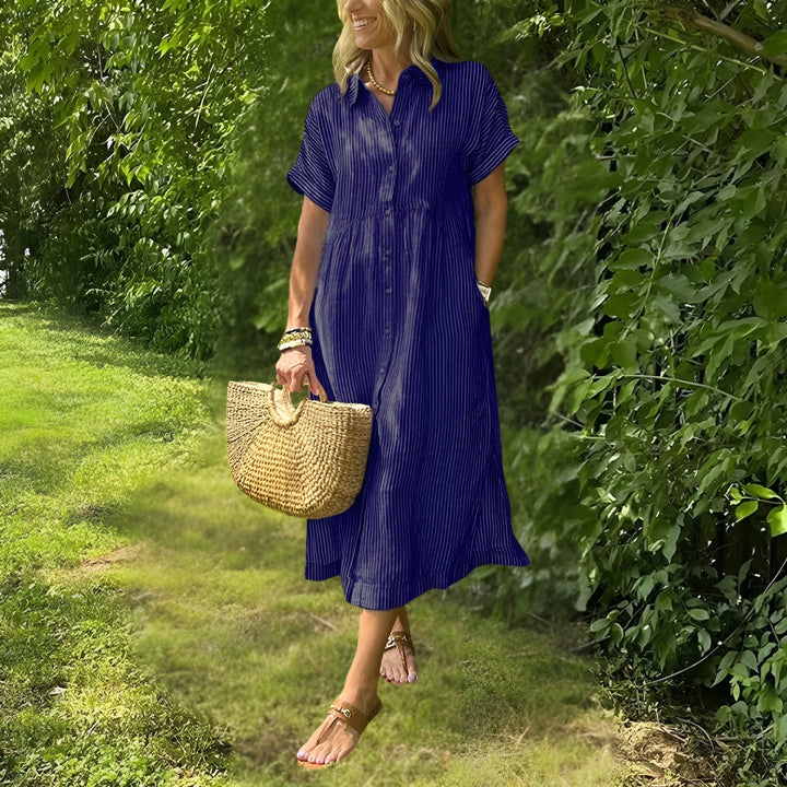 Comfortable women's striped midi dress, perfect for an everyday elegant style with a flattering silhouette.