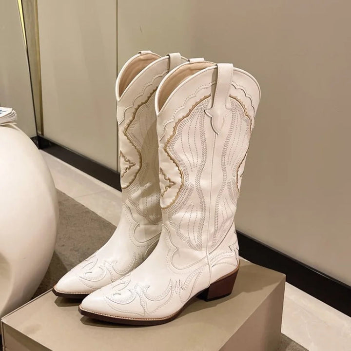 Women's embroidered waterproof western cowboy boots with pointed toe, perfect for stylish outdoor wear & fall fashion.