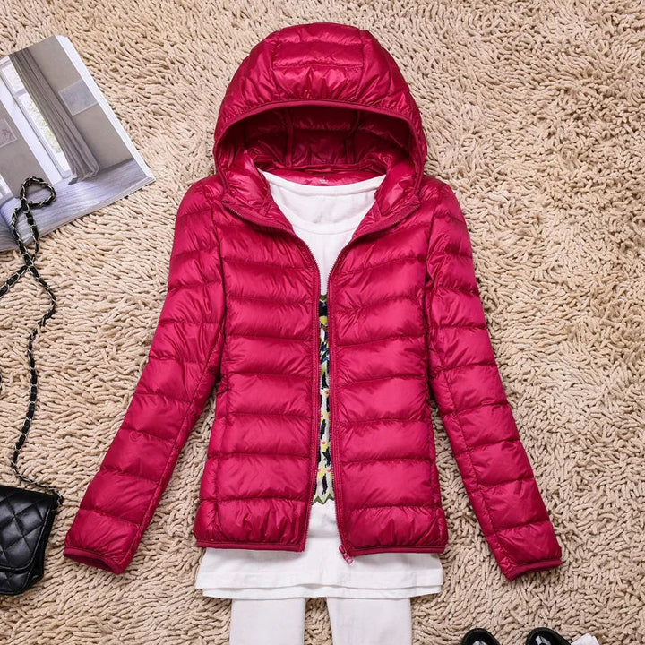 Close-up of the hood on a women's packable puffer jacket. Provides extra warmth for cold weather.