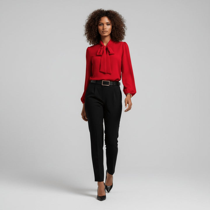 Sophisticated women's bow-tie blouse, perfect for smart casual or office wear. Features elegant long sleeves & relaxed fit.