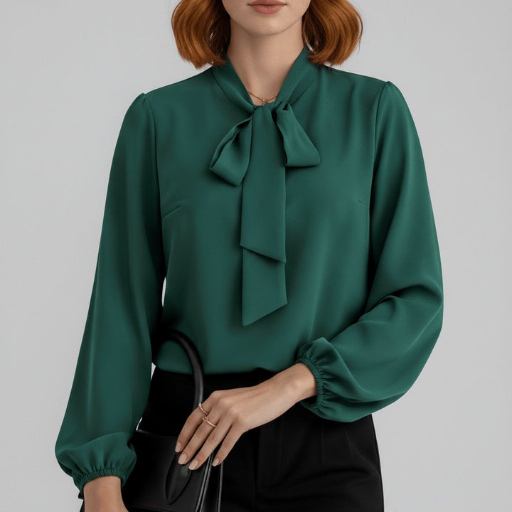 Chic women's long-sleeve bow-tie blouse. This elegant top features a relaxed fit & stylish puff sleeves for any occasion.