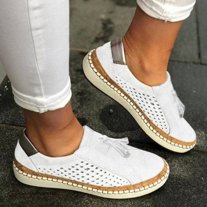 Lightweight women's slip-on shoes with a flexible design, cushioned comfort, and anti-slip traction.