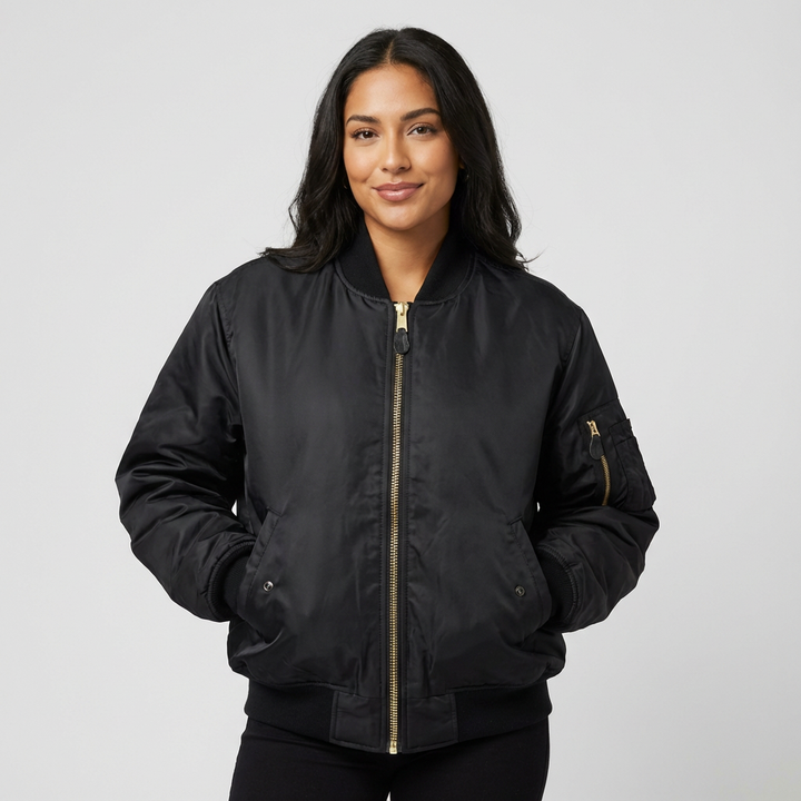 Woman enjoying outdoors in a stylish and comfortable women's utility bomber jacket, perfect for casual adventures.