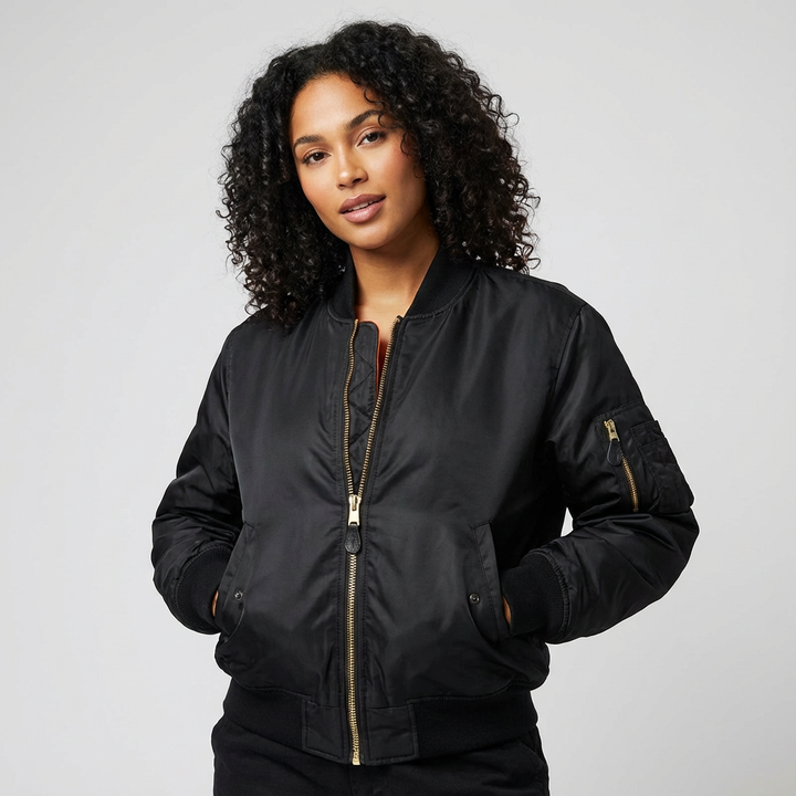 Utility bomber jacket for women, featuring practical pockets & durable fabric for versatile outerwear.