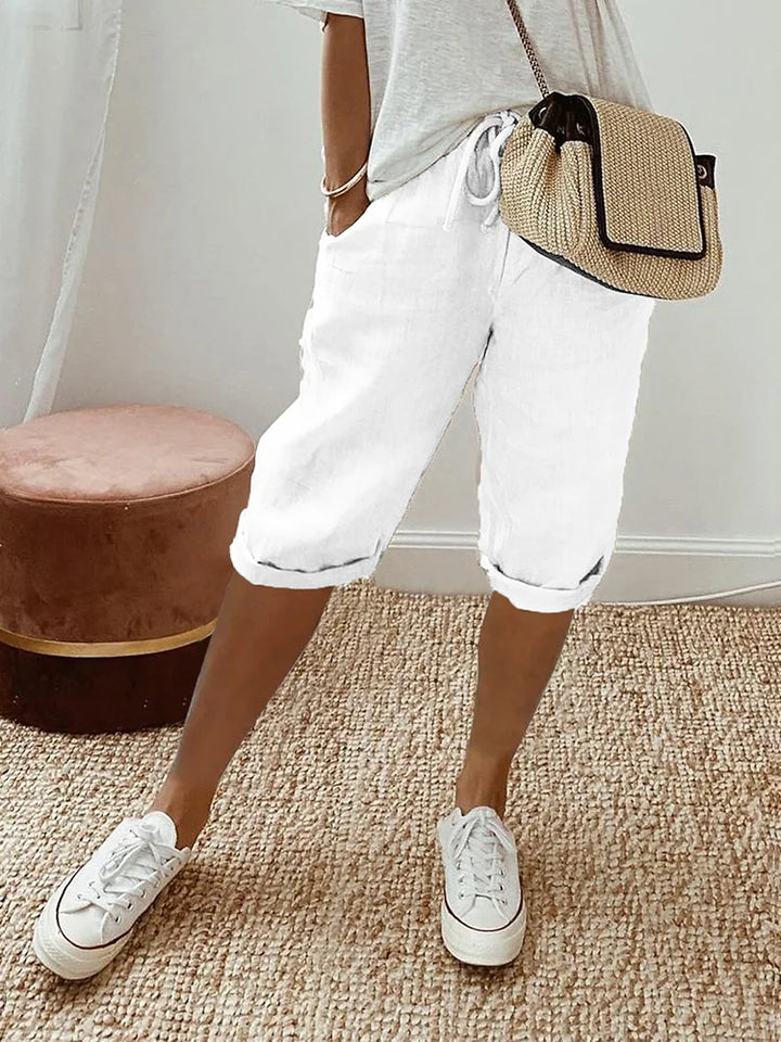 Breathable men's apparel: relaxed fit summer shorts with pockets, ultimate comfort.