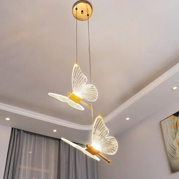 Whimsical LED butterfly pendant lamp, a magical ceiling light for kids' room & nursery decor. Adjustable.