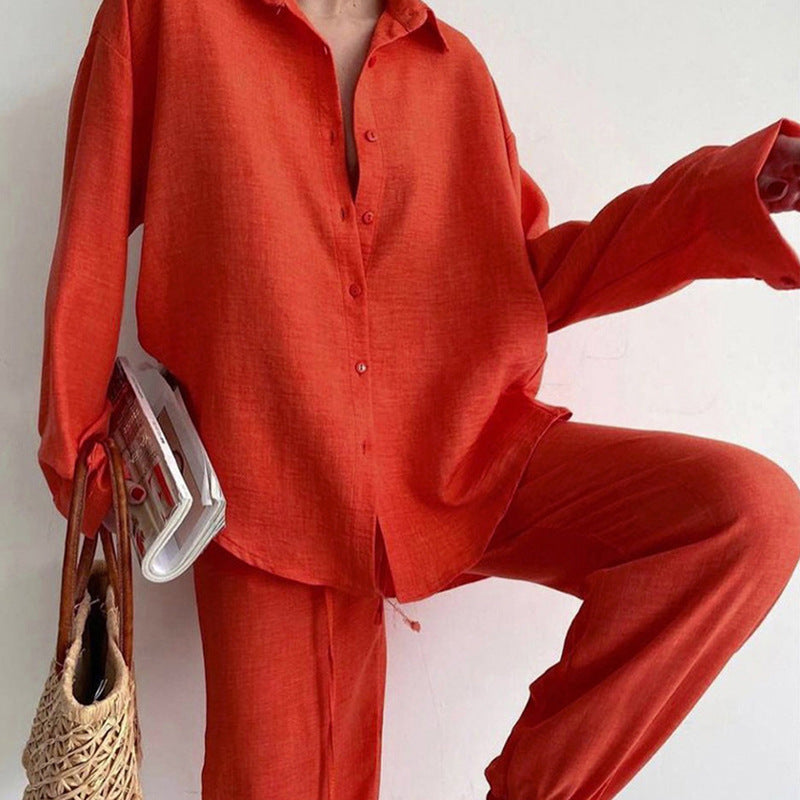 Chic women's two-piece outfit: elegant blouse & wide leg pants. Ideal for summer fashion, travel, and relaxed comfort.