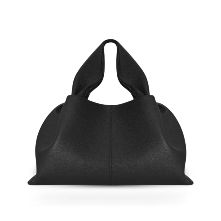 Sophisticated women's shoulder purse made from faux leather, designed with an elegant magnetic clasp for security.