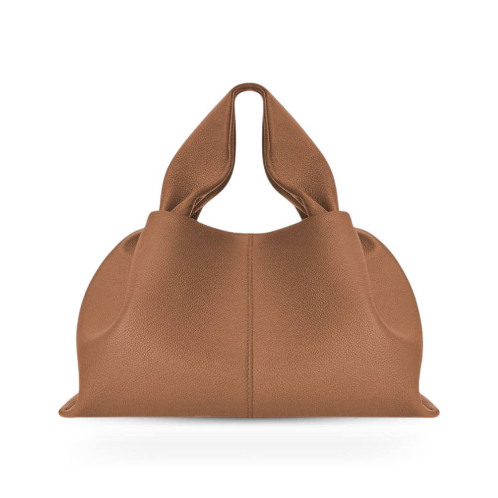 Women's elegant handbag, a stylish shoulder bag with a secure magnetic clasp for quick and safe access to items.