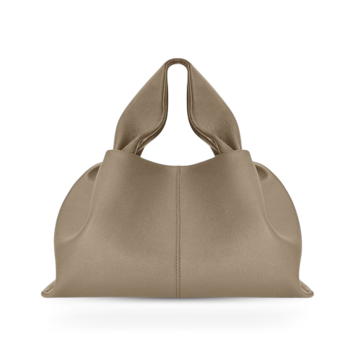 Elegant women's shoulder bag featuring a discreet yet strong magnetic clasp, perfect as a versatile everyday accessory.