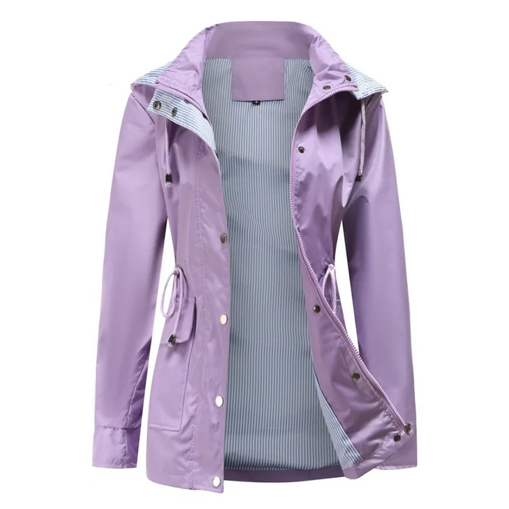 Versatile women's trench coat, showcasing its detachable hood for customizable weather protection. Outdoor ready.