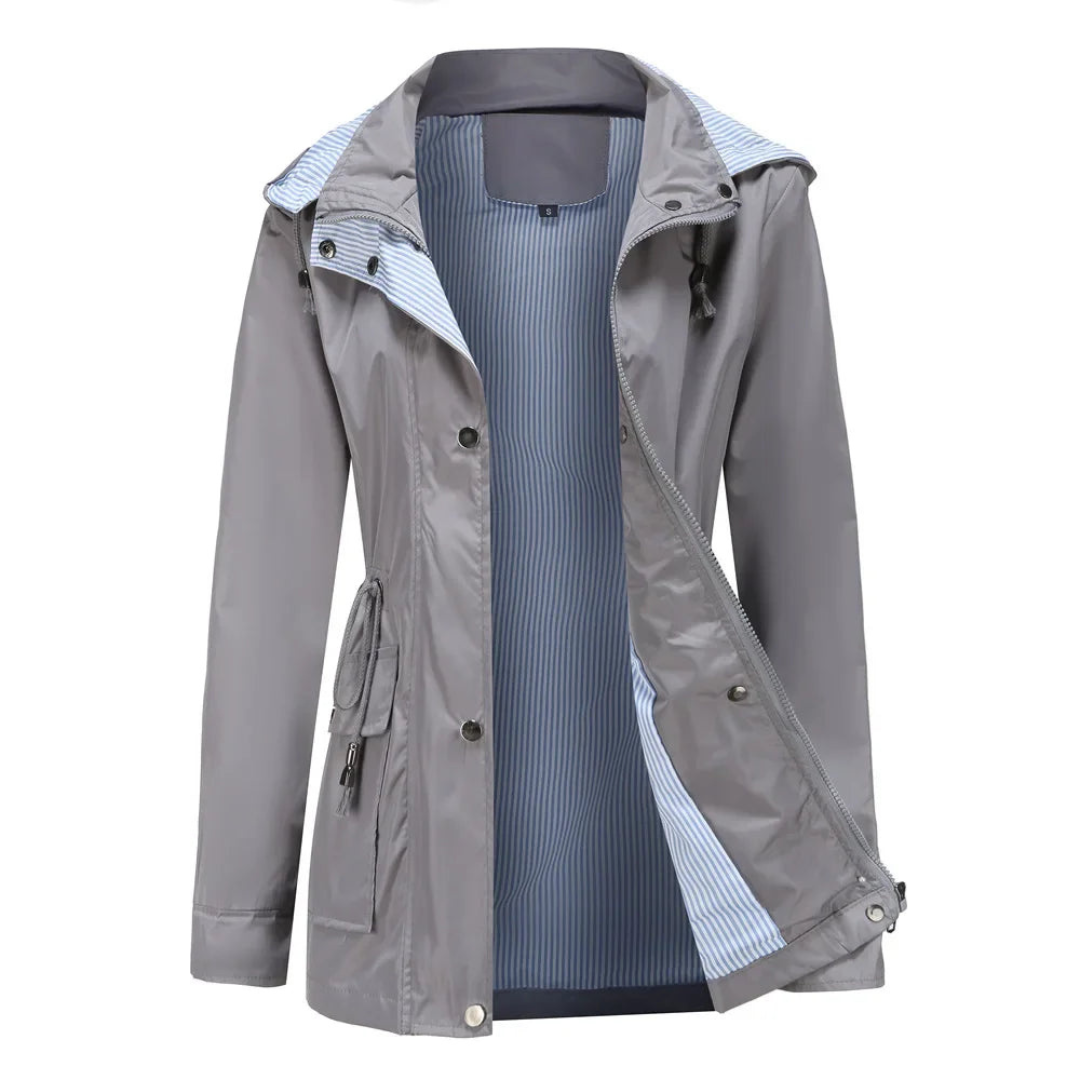 Back view of a long, elegant women's waterproof trench coat, ideal for mild winter & everyday chic style.