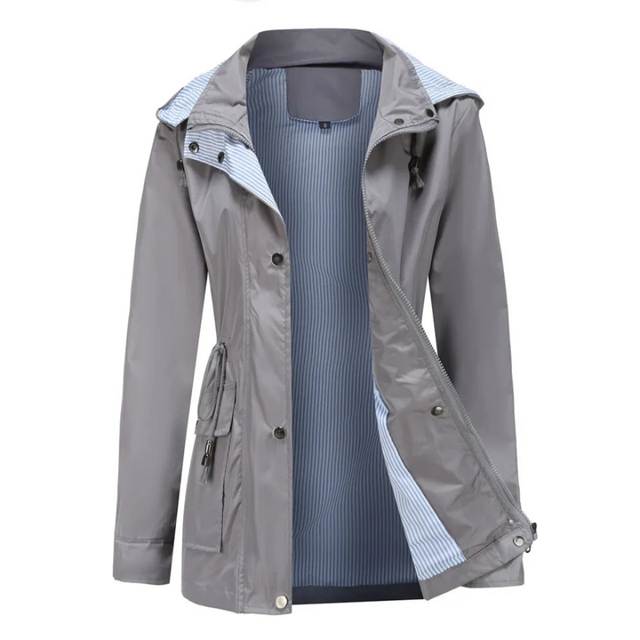 Back view of a long, elegant women's waterproof trench coat, ideal for mild winter & everyday chic style.
