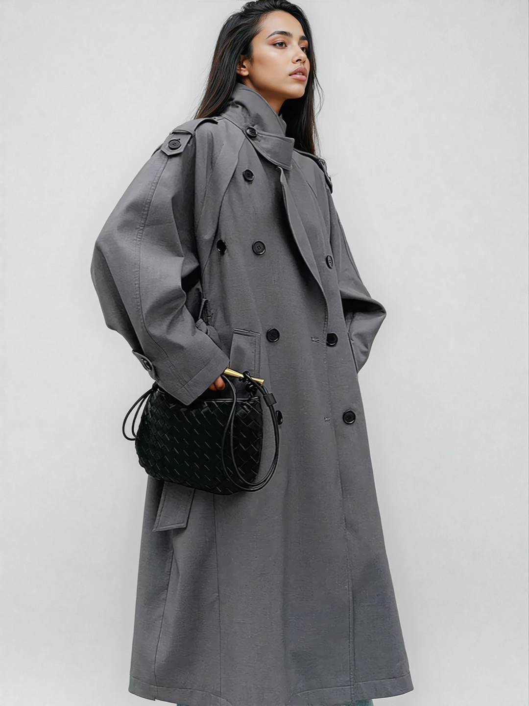 Women's oversized long trench coat in classic khaki with double-breasted design and wide lapels for fall fashion.