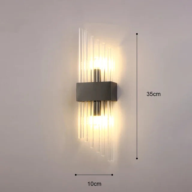 Modern gold finish wall light. Regal LED indoor lamp, perfect for sophisticated home decor accent.