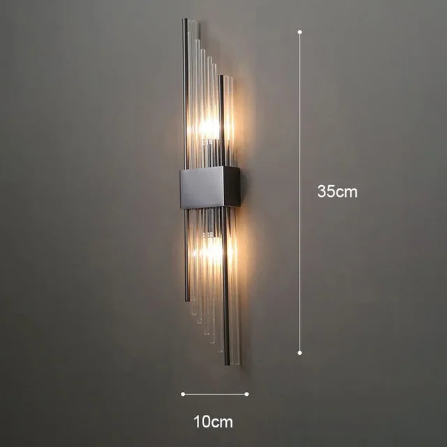 Regal LED wall sconce mounted on a textured wall, offering elegant accent lighting. Black finish.