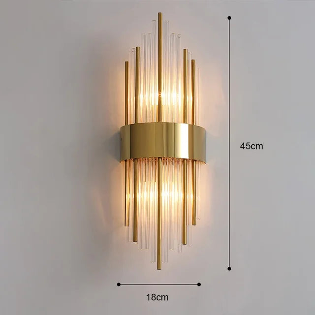 Modern luxury indoor lamp: Gold finish LED wall light with sparkling crystal glass for home decor.