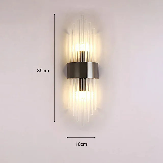 Regal indoor wall lamp. Elegant LED lighting with gold accents & sparkling crystal glass design.