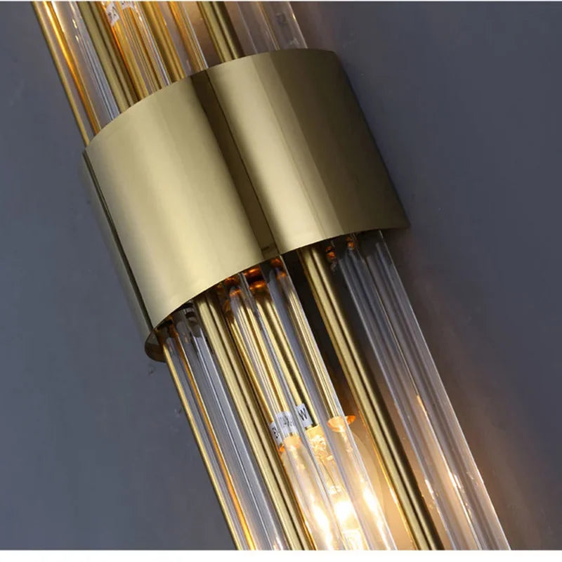 Luxury wall sconce with intricate crystal glass details & a sleek black finish. LED accent light.