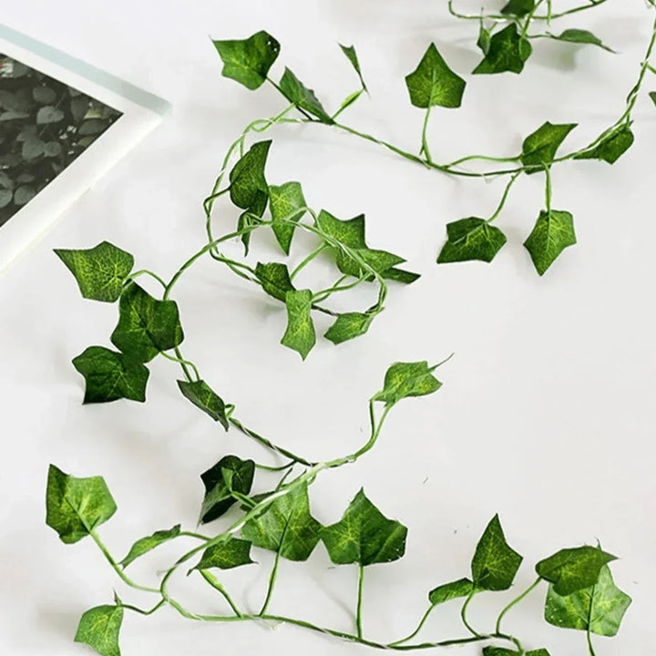 Battery operated warm white LED leaf string lights, creating a cozy ambiance anywhere.