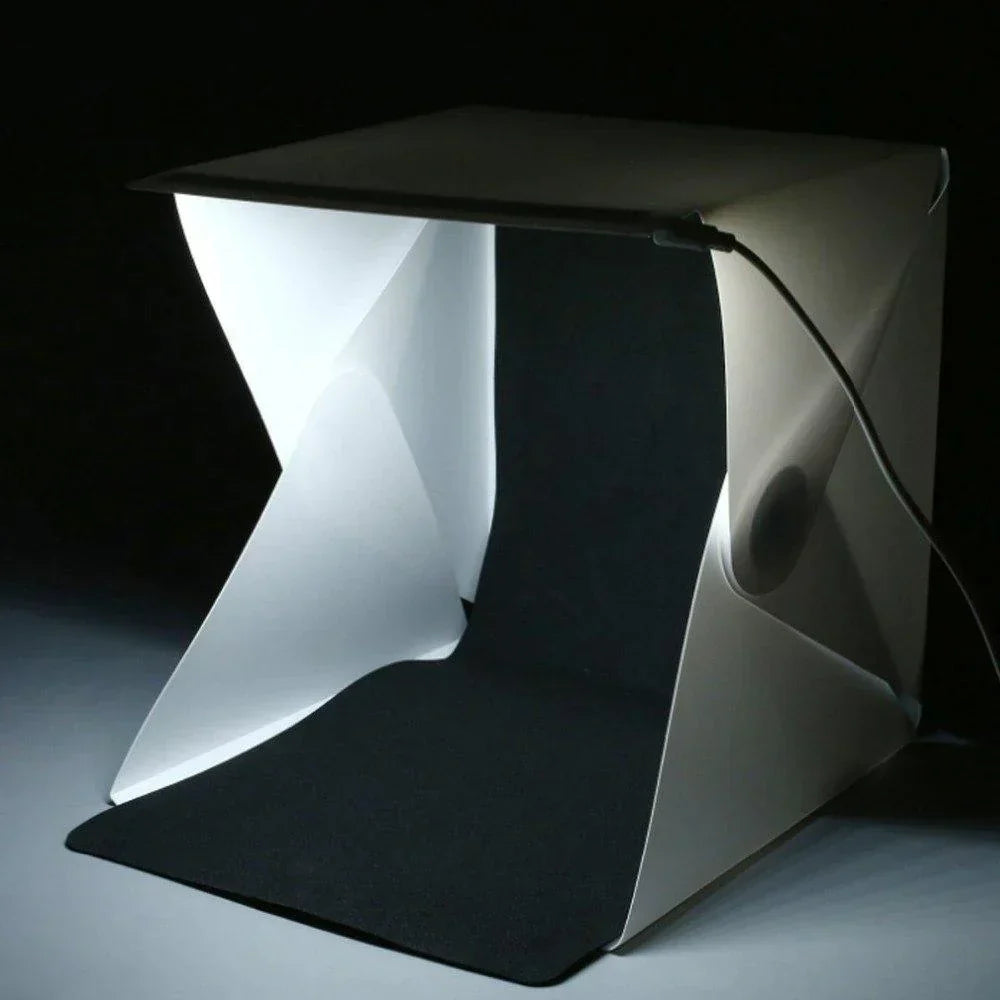Mini portable photo booth light box for crisp, bright product images, essential for ecommerce listings.