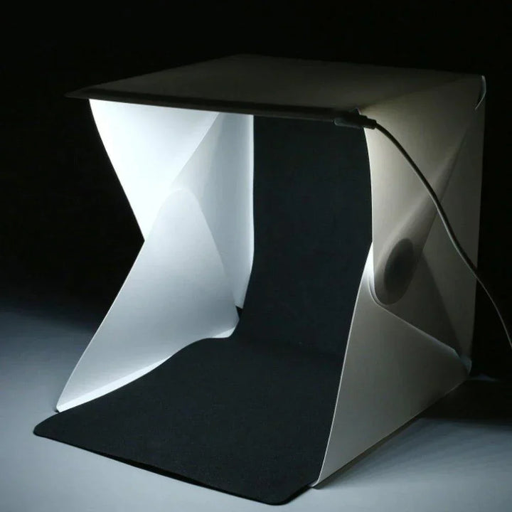 Mini portable photo booth light box for crisp, bright product images, essential for ecommerce listings.