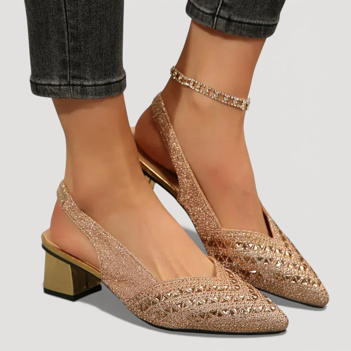 Sparkling women's glitter heels with slingback strap & sturdy block heel. Elegant for any special occasion.