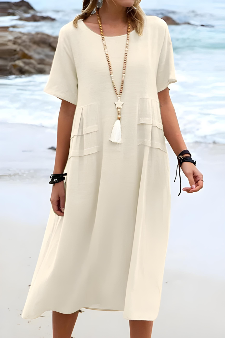 Elegant women's layered midi dress in a chic design, perfect for versatile comfort & style.