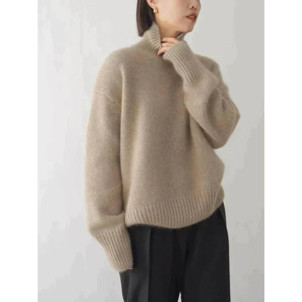 Elegant women's warm wool turtleneck sweater, luxurious and cozy for winter fashion.