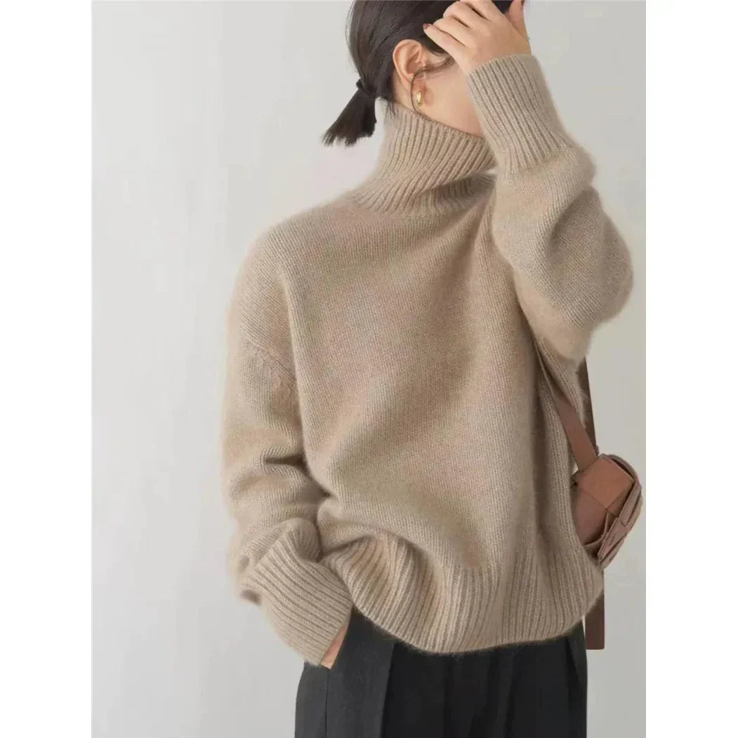 Luxurious women's classic wool knit turtleneck sweater, providing elegant warmth and comfort.