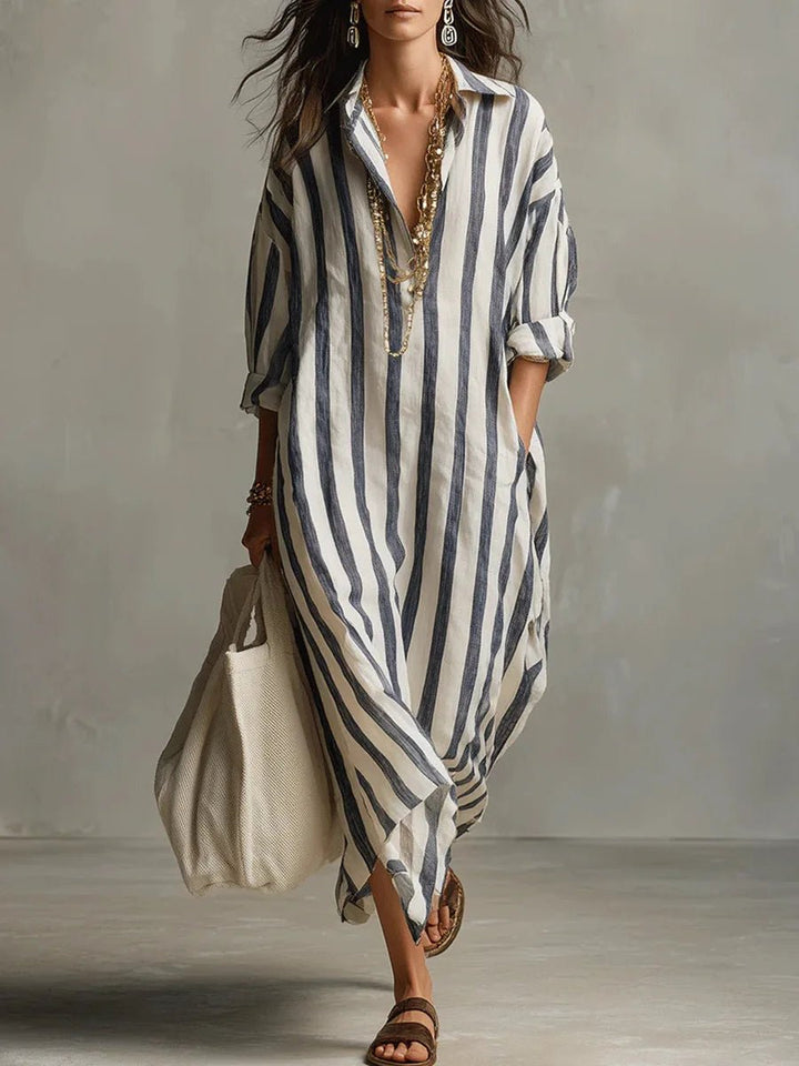 Women's striped maxi dress with relaxed fit, collar, and pockets, perfect for summer casual wear.