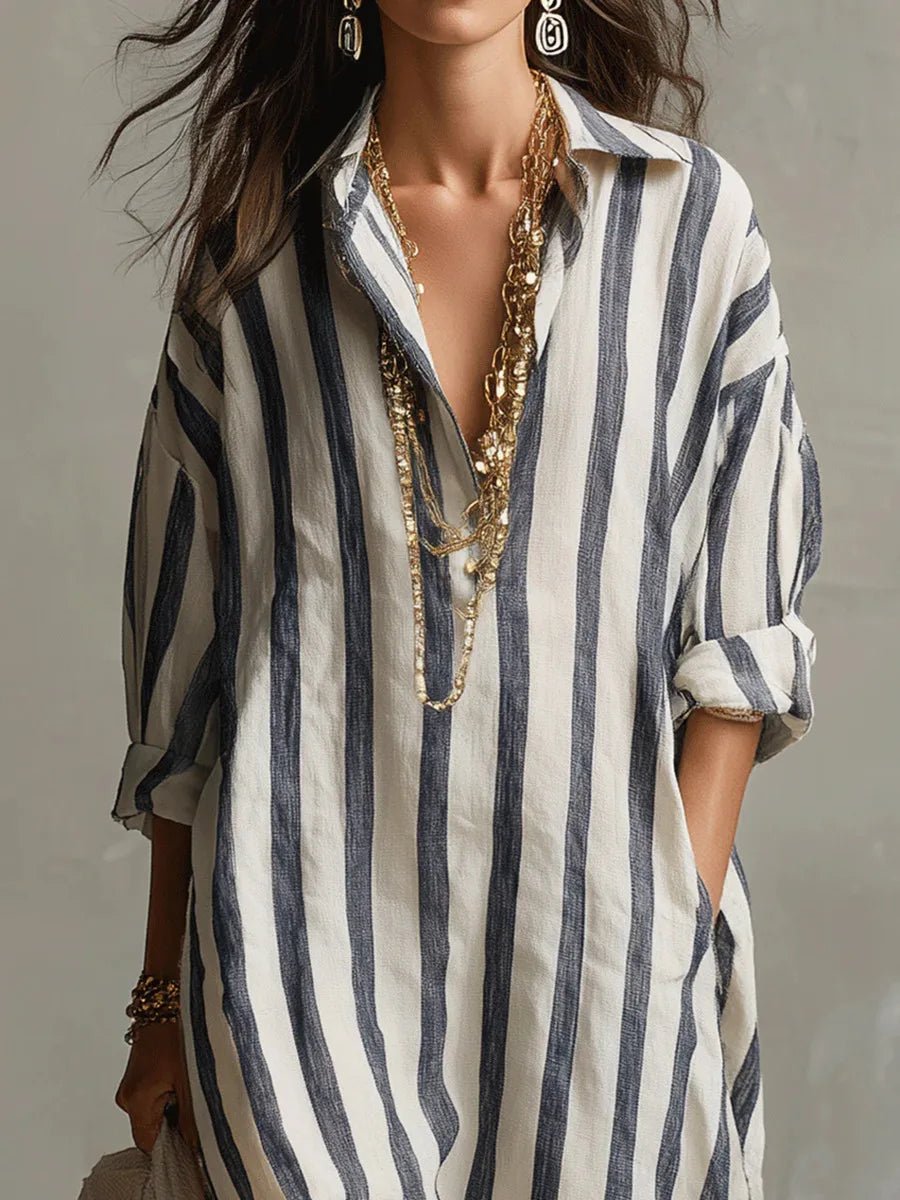Stylish striped maxi dress for women, featuring a relaxed fit, practical pockets, and elegant collar.