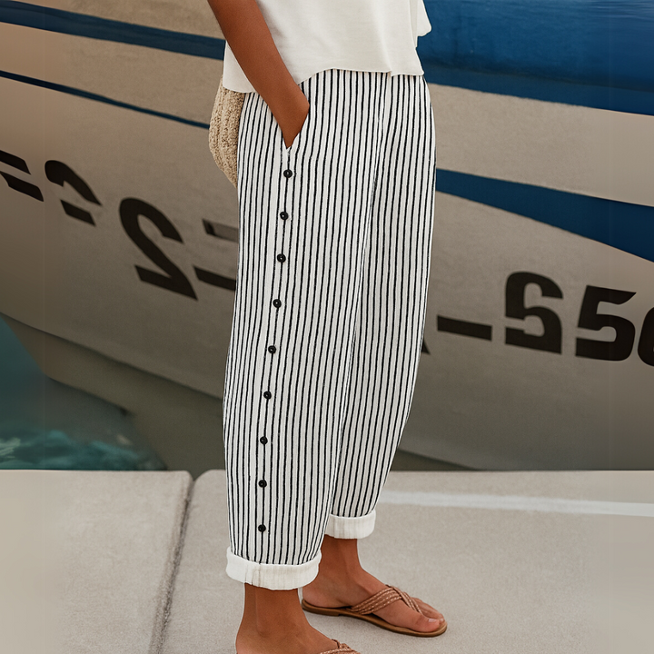 Elegant women's high-waisted striped wide-leg trousers, perfect for chic office wear or modern casual fashion.