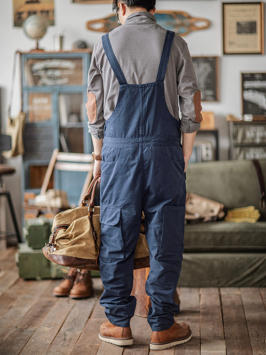 Functional men's utility overalls, featuring ample storage & a comfortable fit for any task.