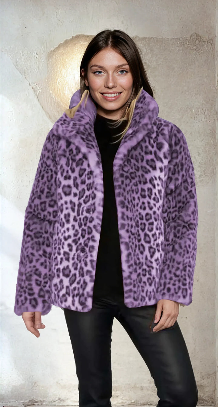 Fashionable women's leopard print teddy jacket, soft and cozy for trendy autumn & winter layering.