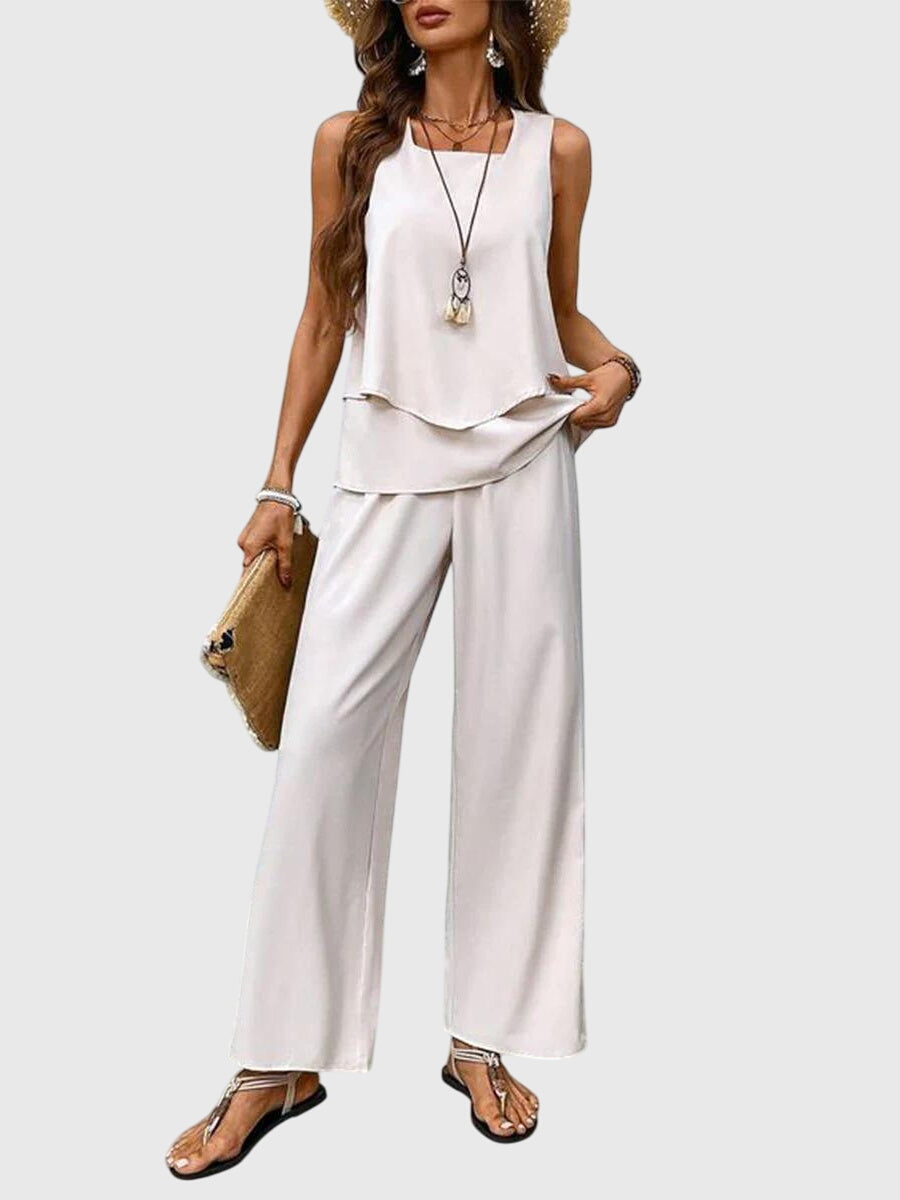 Stylish women's two-piece set for summer fashion. Elegant floral print with a breathable, relaxed fit.