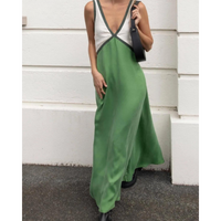 Soft fabric texture on women's comfortable color block maxi dress, elegant and modern.
