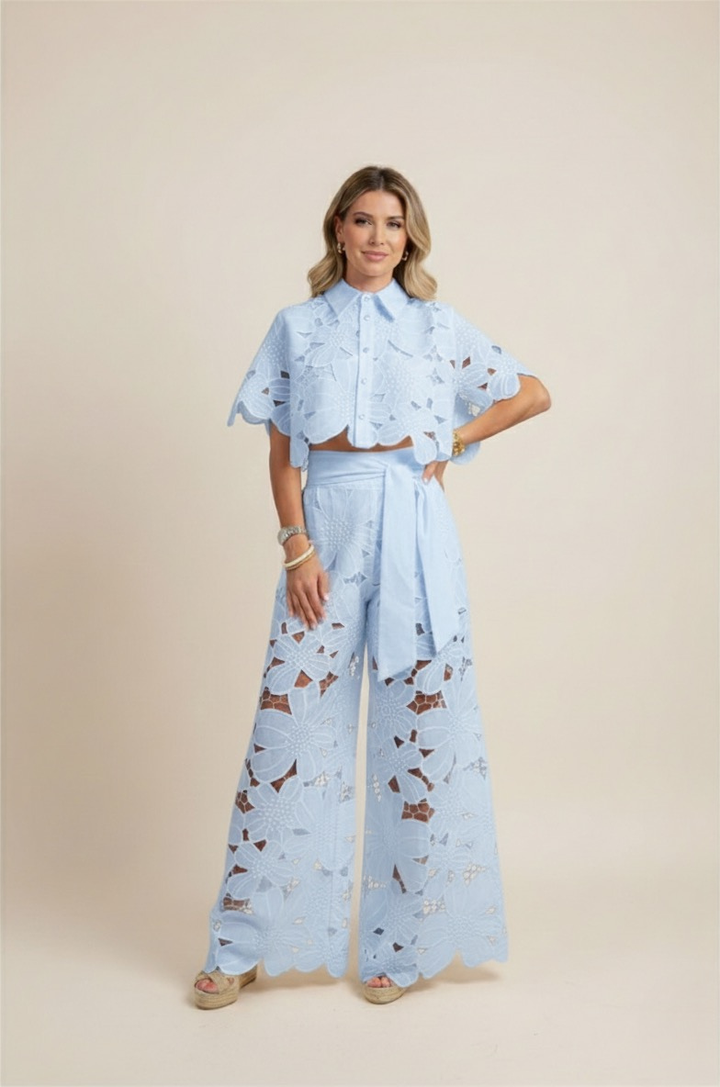 Chic women's floral embroidered top and comfortable wide-leg pants set. Casual elegant fashion.