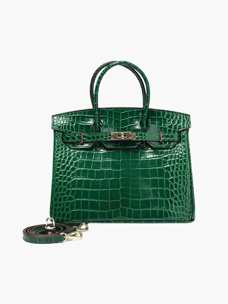 Premium women's leather handbag with a smooth texture and elegant metallic closure.
